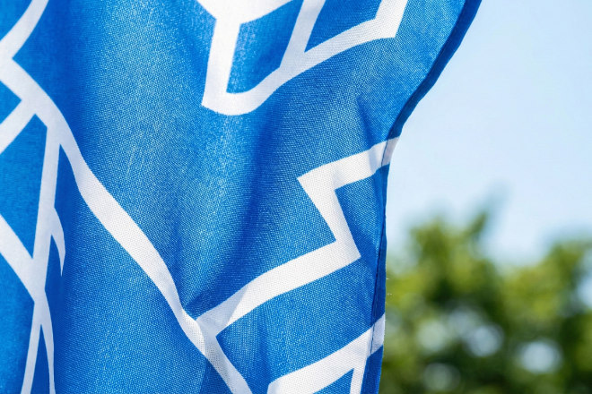 信頼感のある青色を基調としたのぼり旗のテクスチャイメージ